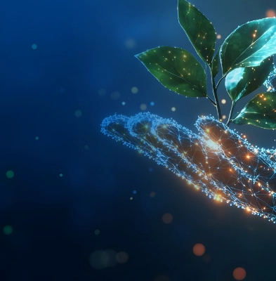 Digital hand holding plant with blue network overlay on dark background representing life sciences digital innovation