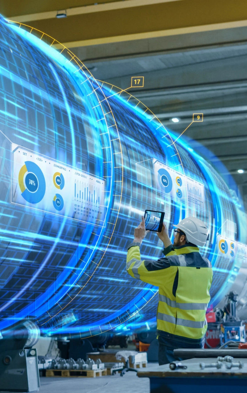 Engineer with tablet viewing holographic dashboards and blue light streams in smart factory showing digital transformation