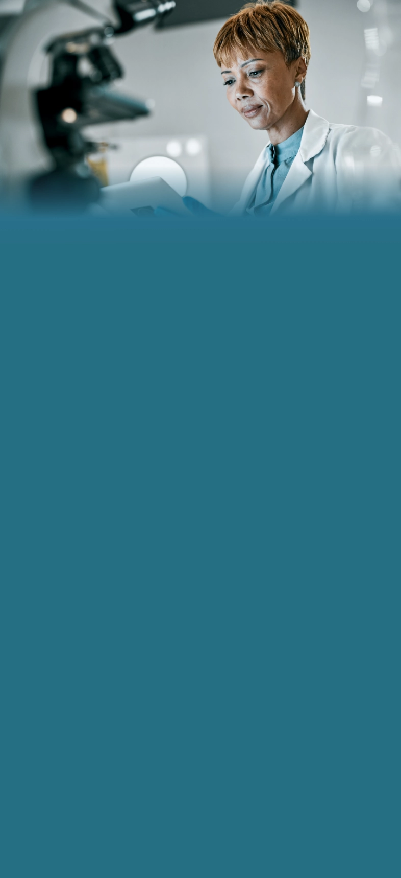 Professional female doctor in white coat reviewing patient records in modern healthcare facility with clinical background